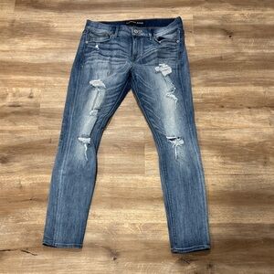 Express Women’s Mid Rise Blue Ripped Skinny Jeans